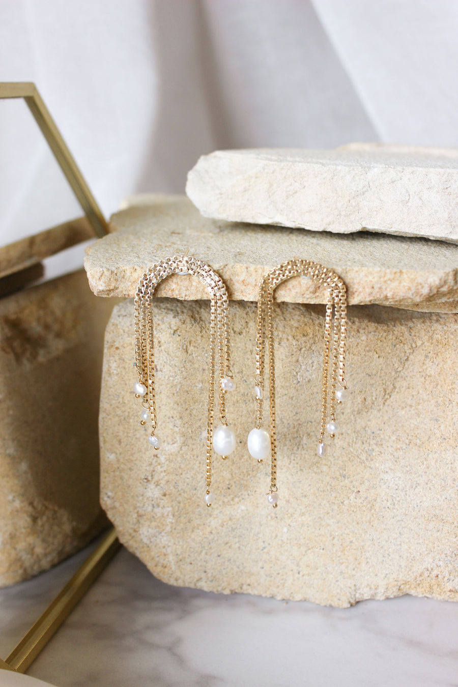Gold pearl chain earrings
